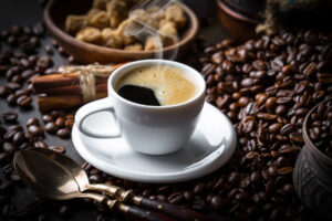 a freshly brewed coffee with coffee beans makes someone wonder how caffeine and anxiety are linked