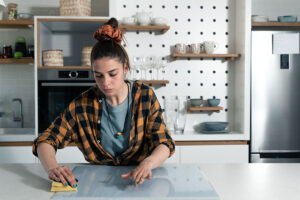 woman in her kitchen is experiencing symptoms of contamination ocd